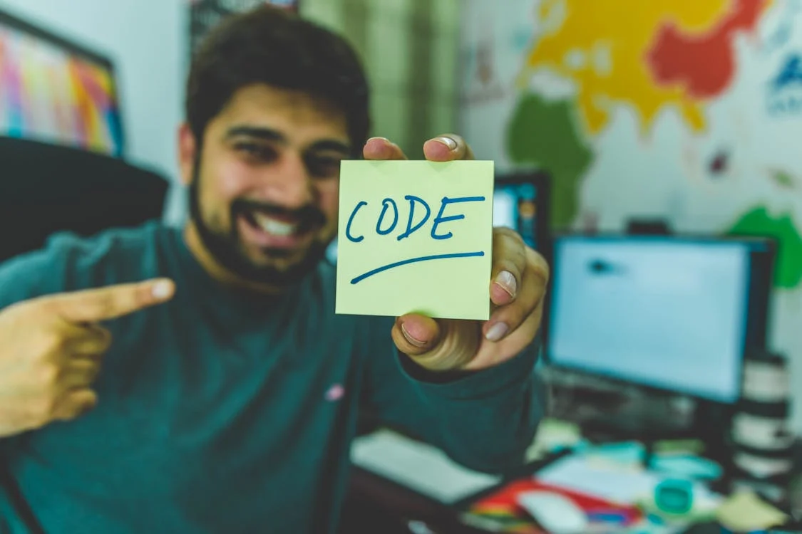 a guy writing code